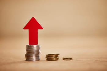 VistaCreate-278007184-stock-photo-increasing-chart-made-coins-red.jpeg