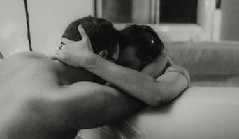 sarah callaghan grey and white holding each other.jpg