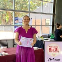 natalie at the wellness fair table.jpg