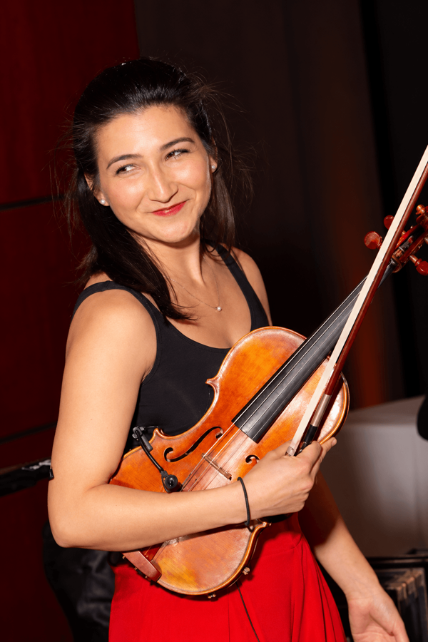 Restored portrait of a violinist.png