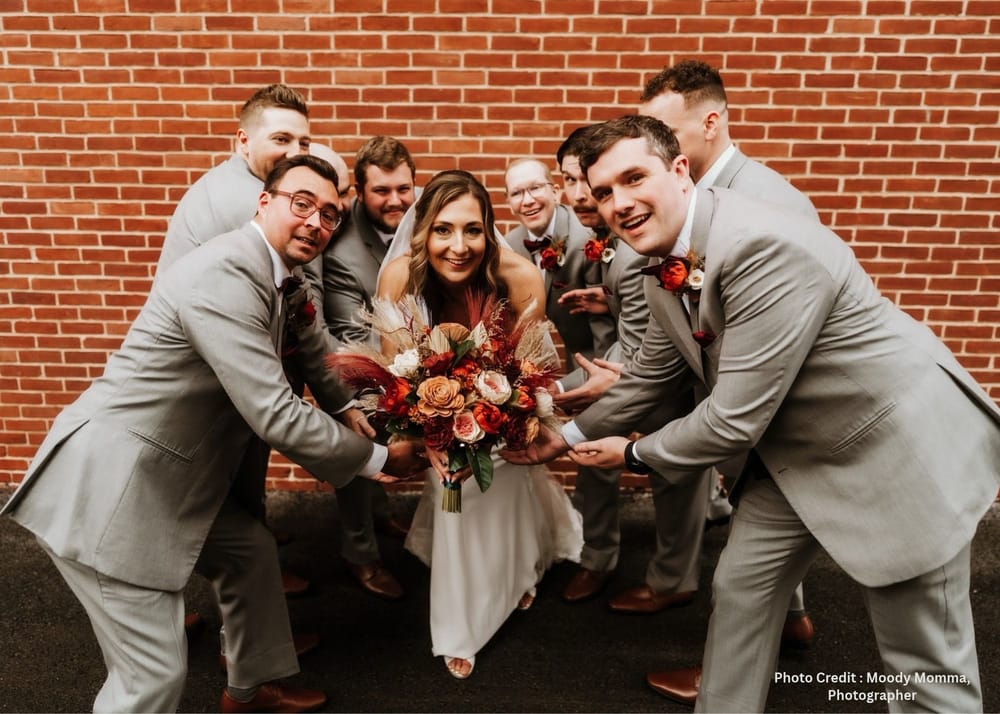 Bride and groomsmen with custom sola wood wedding flowers in Frederick, Maryland