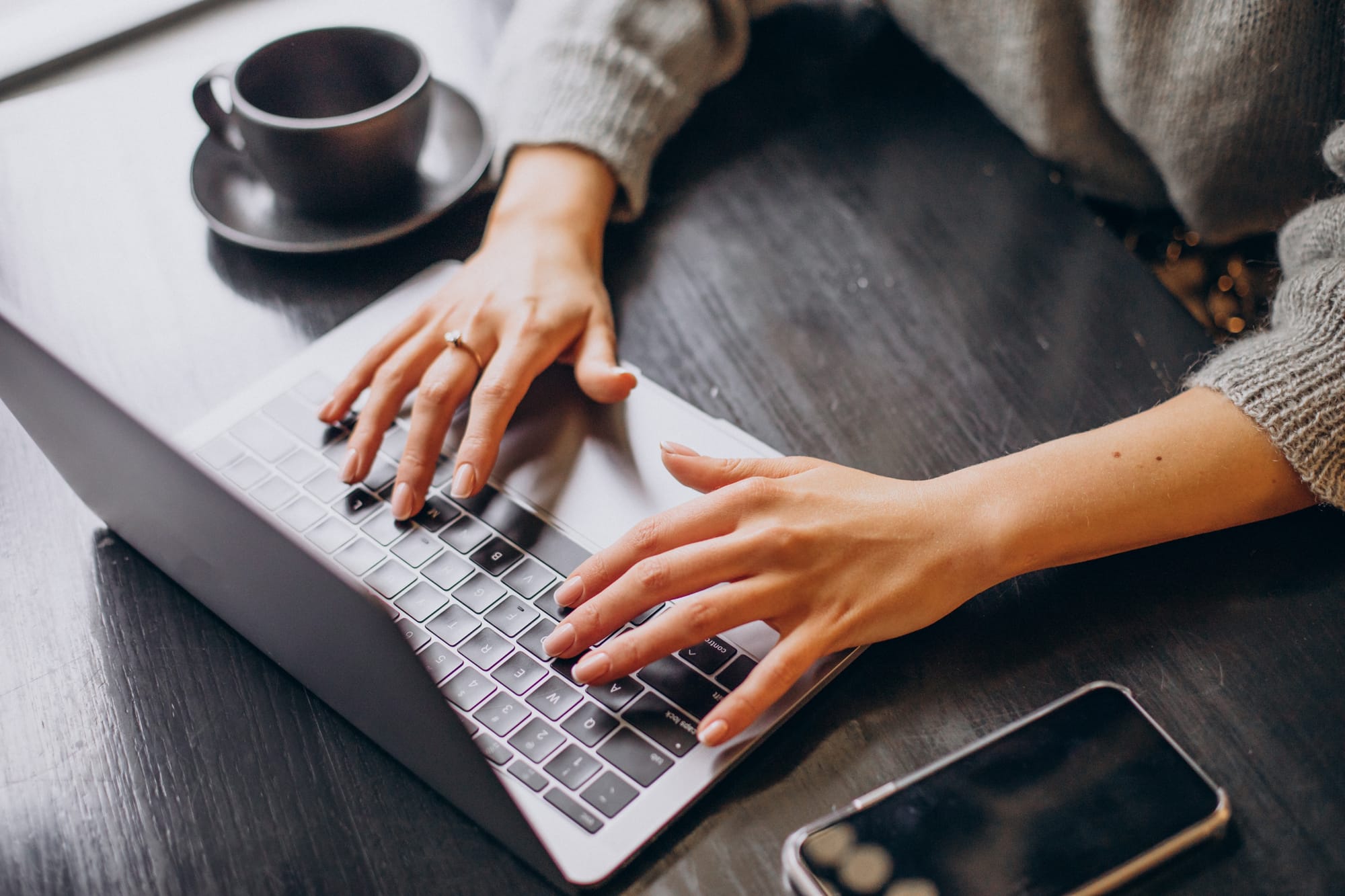 female-hands-typing-computer-keyboard.jpg