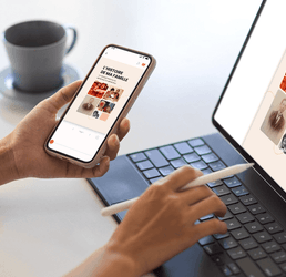 Close up view of female hand working with digital tablet and smartphone mockup screen.png