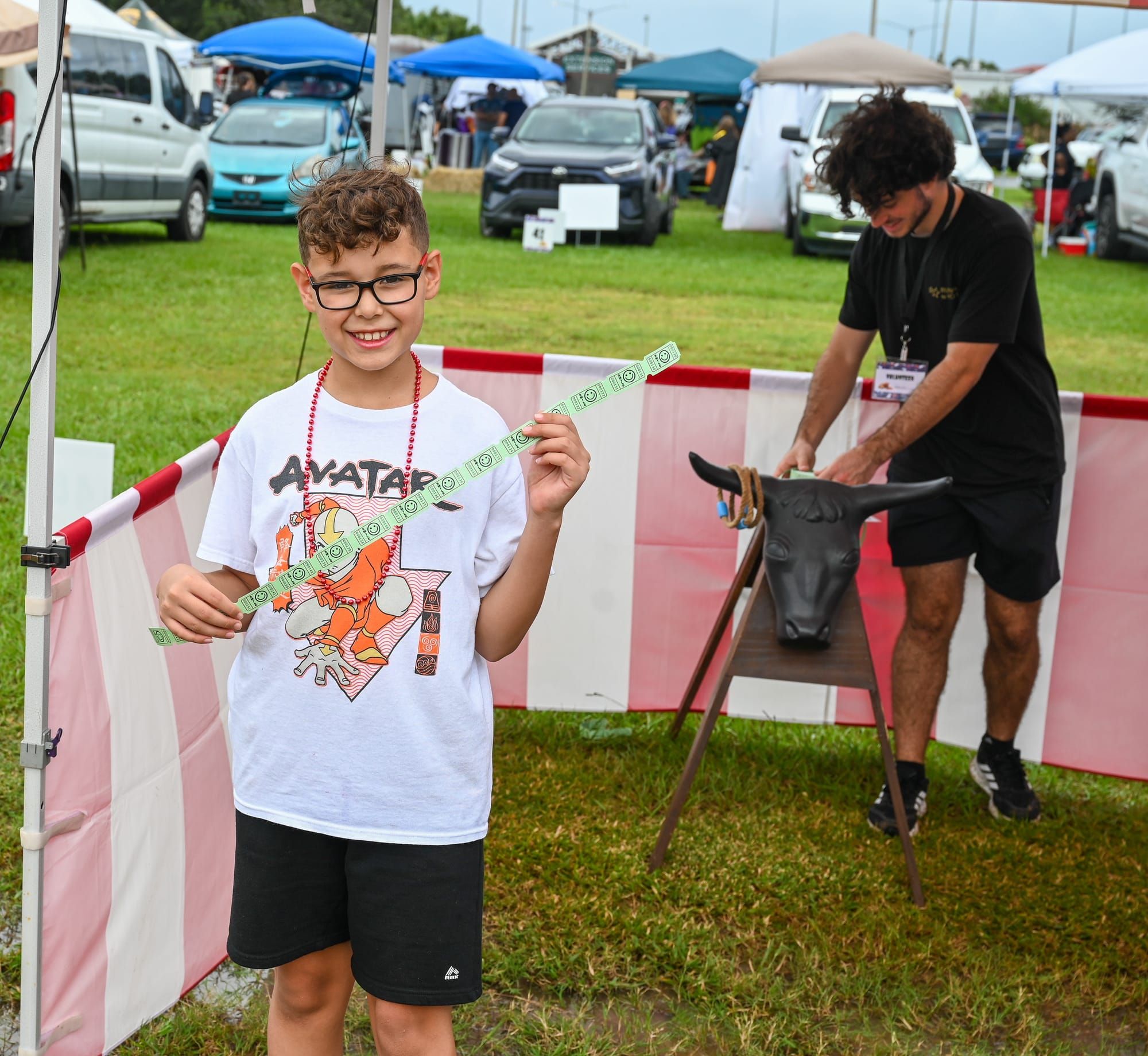 TrunkorTreat2025 - Sibling at Carnival Games 2.jpg